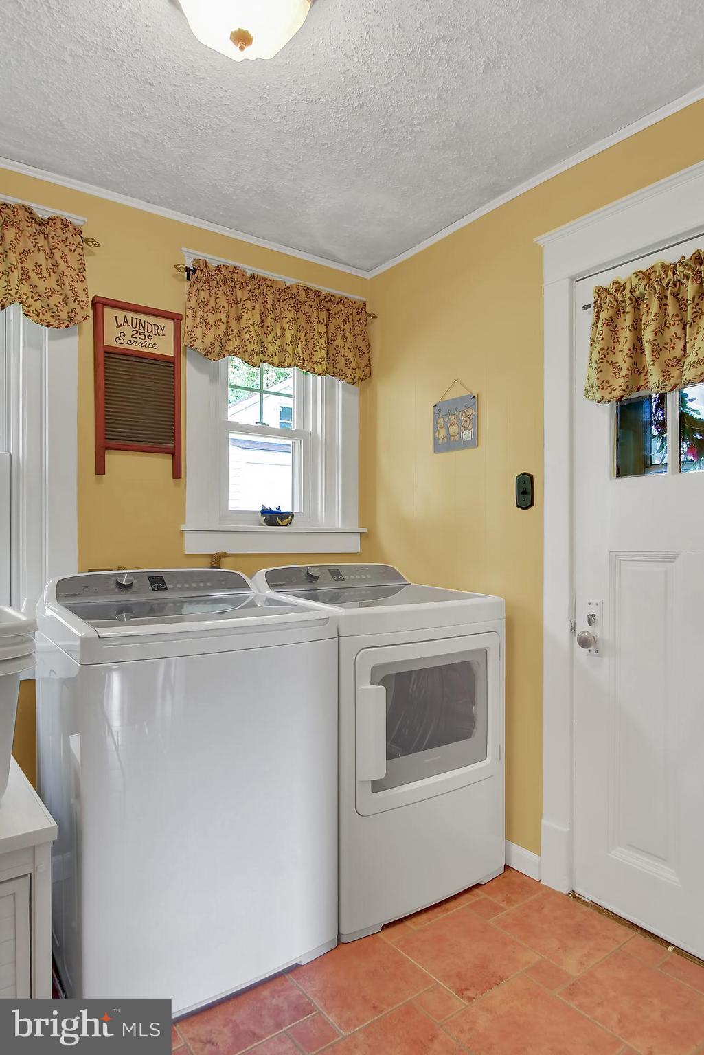 1704 Friedensburg Road Reading, PA 19606 - Photo 8 of 25 a kitchen with a stove a sink and a refrigerator