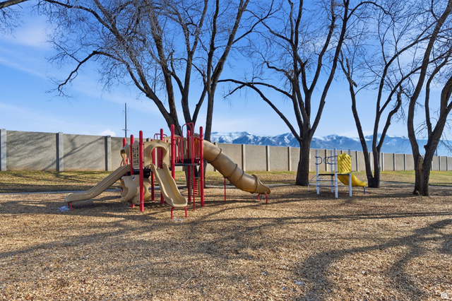 1615 North Angel Street, Unit E Layton, UT 84041 - Photo 42 of 42 Communal playground featuring a mountain view