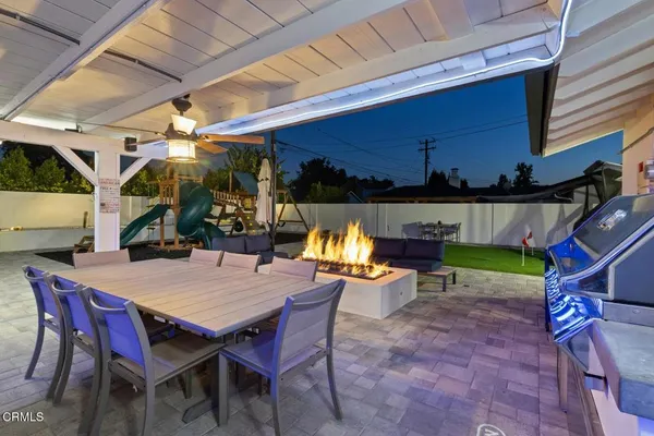 an outdoor space with furniture