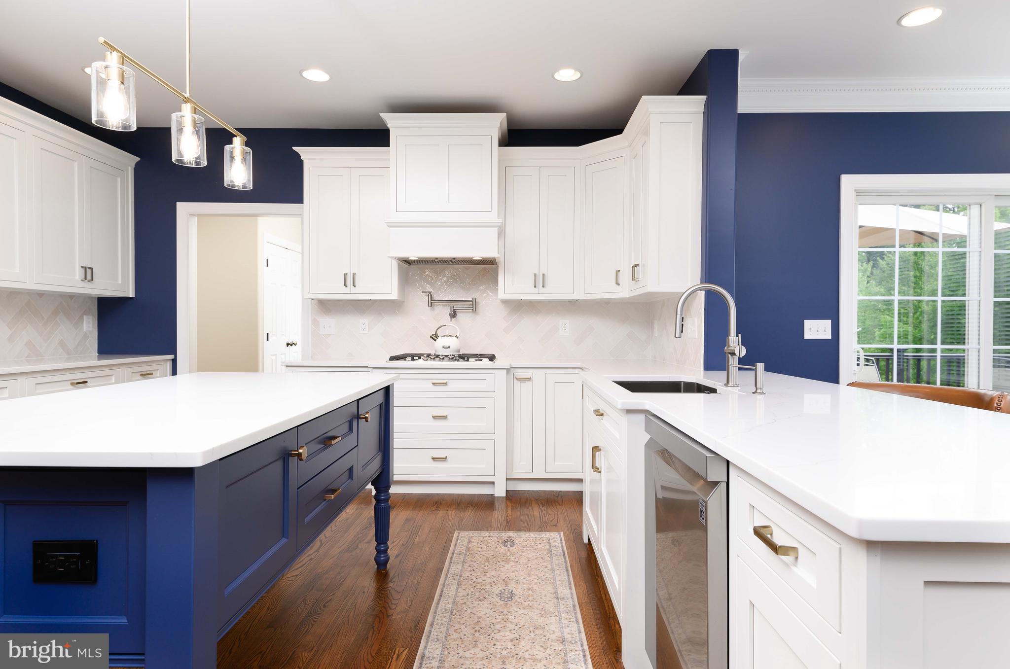 128 Harrogate Drive Landenberg, PA 19350 - Photo 18 of 52 a kitchen with a sink stove and refrigerator
