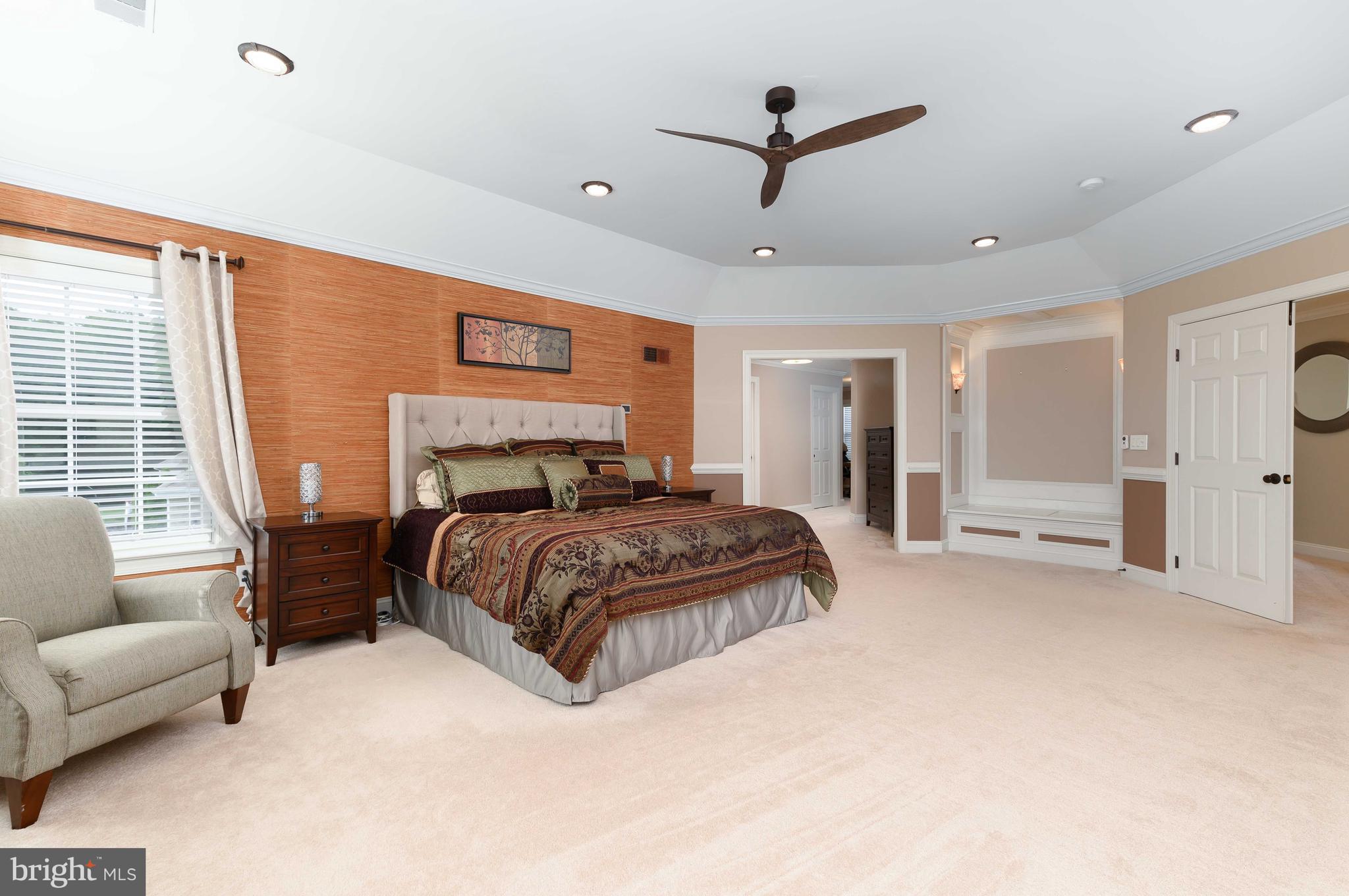 128 Harrogate Drive Landenberg, PA 19350 - Photo 28 of 52 a bedroom with a large bed couch and a window