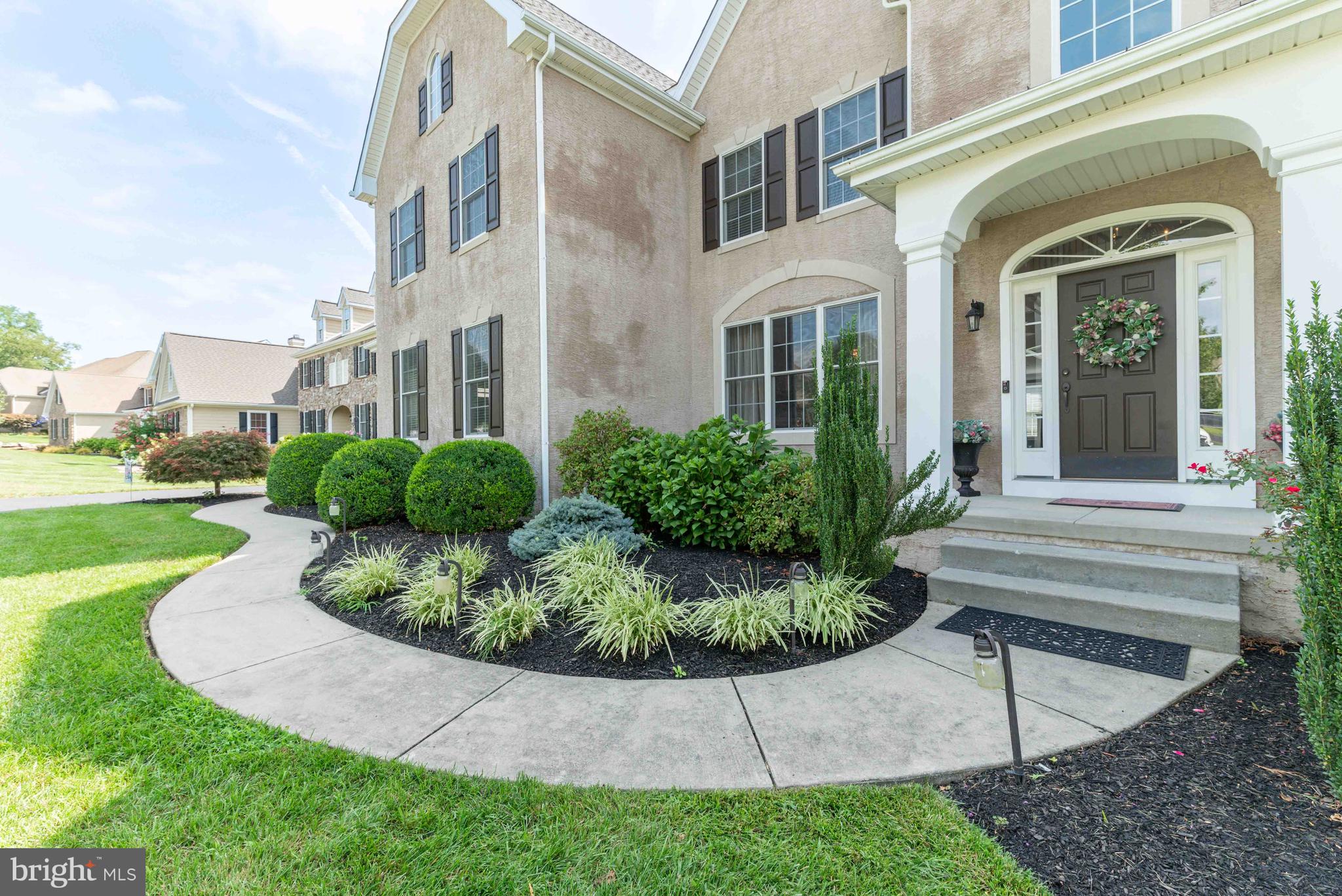 128 Harrogate Drive Landenberg, PA 19350 - Photo 3 of 52 a view of a building with a garden