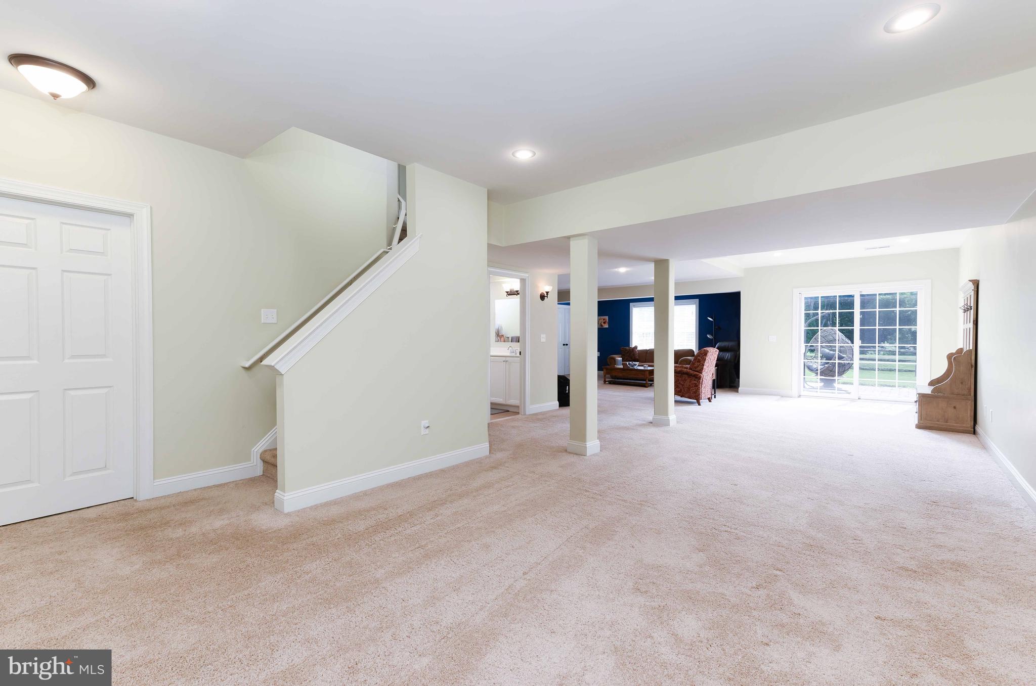 128 Harrogate Drive Landenberg, PA 19350 - Photo 38 of 52 a view of an empty room with wooden floor and a window