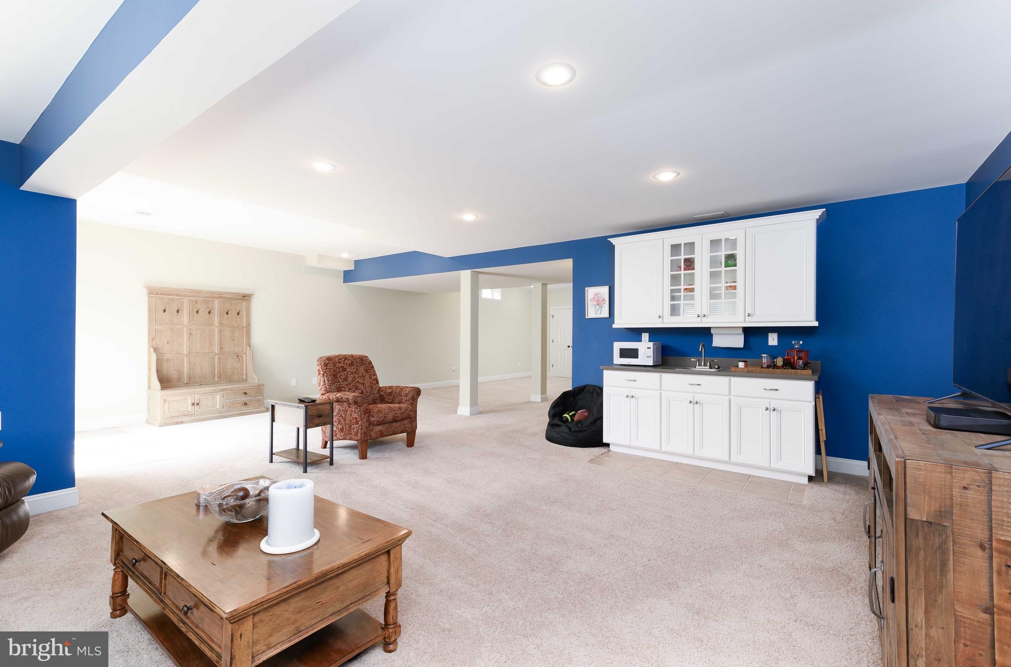 128 Harrogate Drive Landenberg, PA 19350 - Photo 39 of 52 a living room with furniture and kitchen view