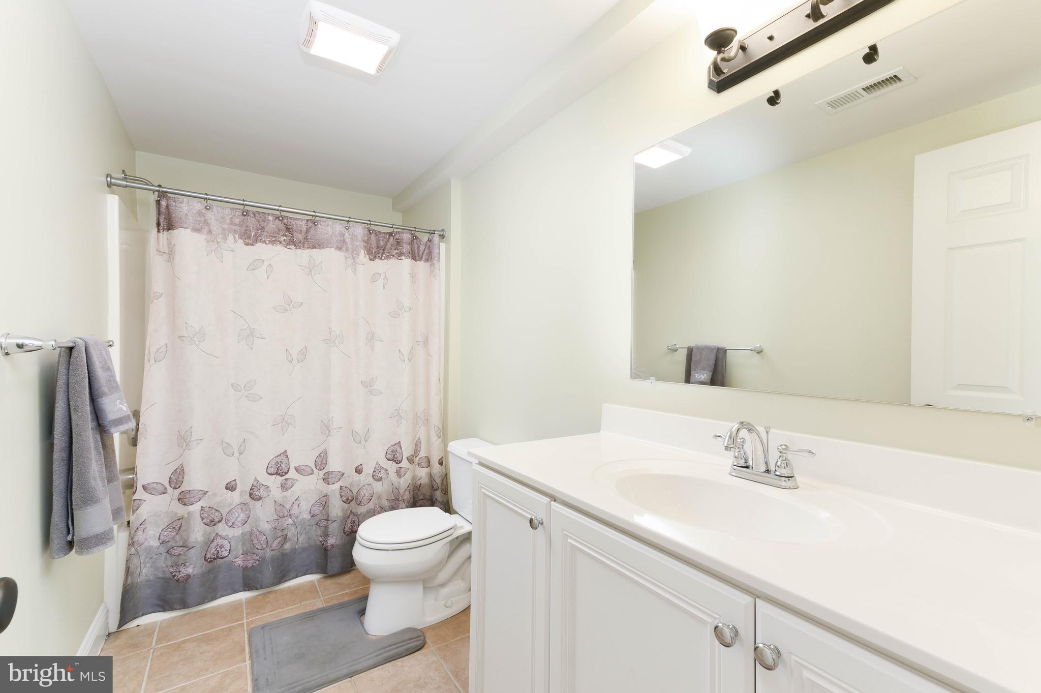 128 Harrogate Drive Landenberg, PA 19350 - Photo 41 of 52 a bathroom with a sink toilet and shower