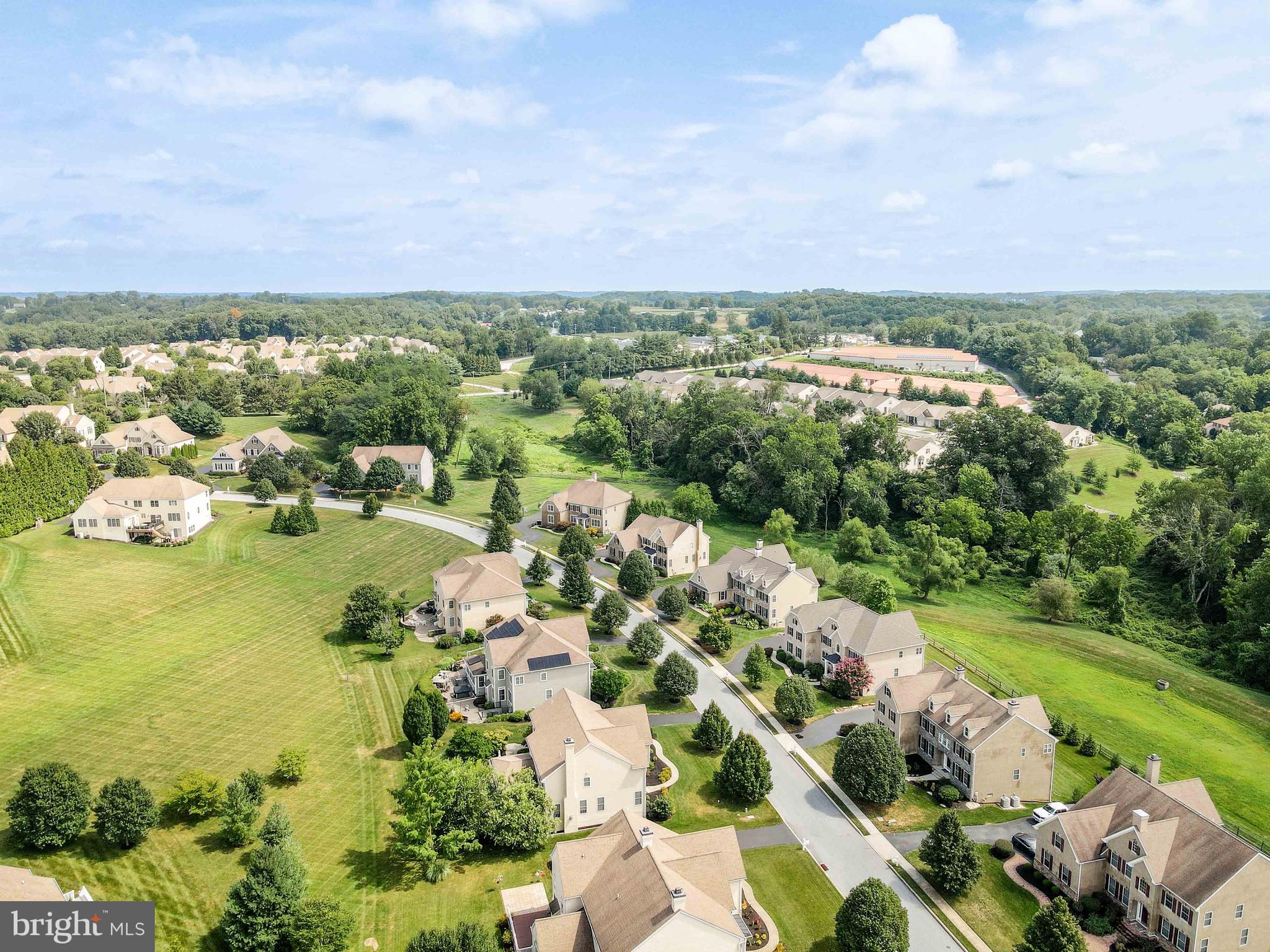 128 Harrogate Drive Landenberg, PA 19350 - Photo 51 of 52 a view of a lake with houses in the back