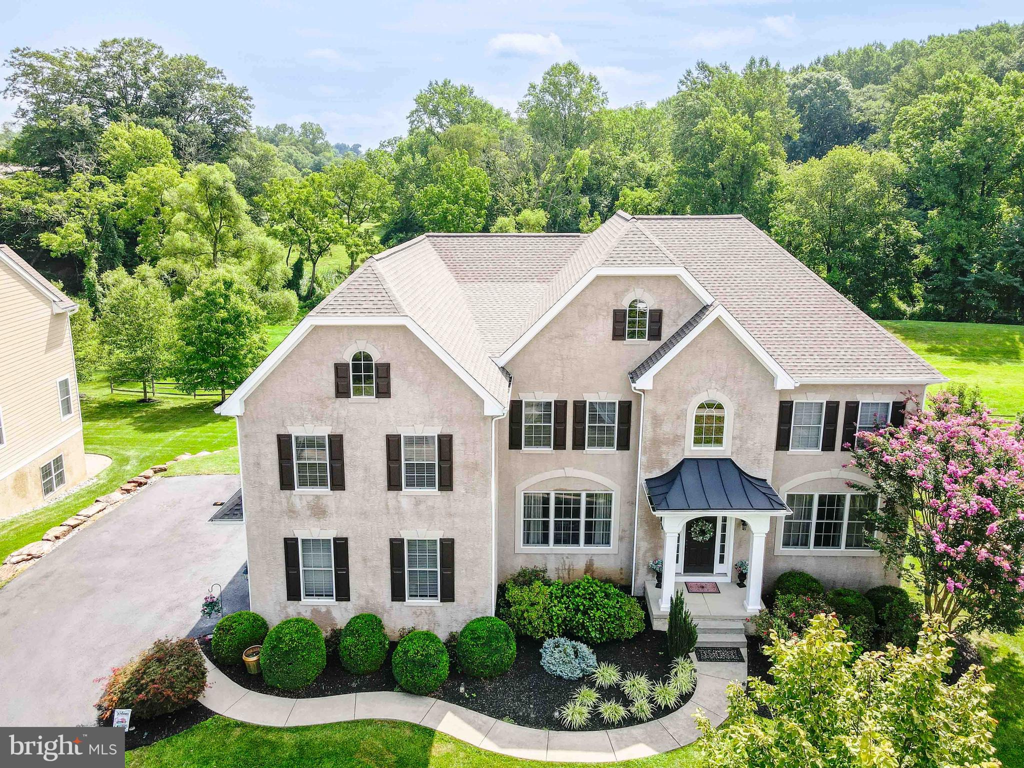 128 Harrogate Drive Landenberg, PA 19350 - Photo 8 of 52 a aerial view of a house next to a yard