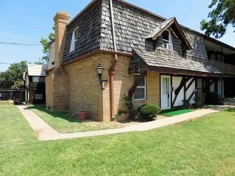 a front view of house with yard