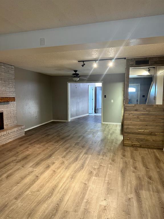 600 Liddon Avenue, Unit 80 Midland, TX 79705 - Photo 5 of 11 a view of large hall with wooden floor