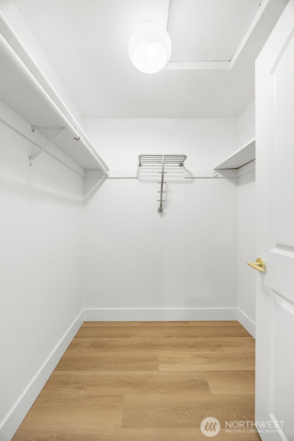 121 West Winesap Road Bothell, WA 98012 - Photo 17 of 29 a view of a room with racks on the wall