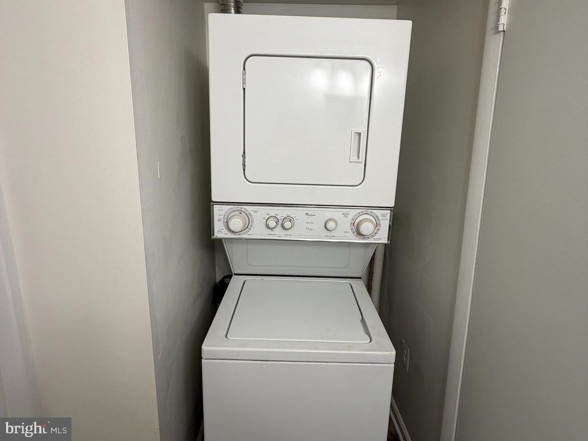 5485 Harpers Farm Road, Unit L3 Columbia, MD 21044 - Photo 12 of 24 a close up view of a washer and dryer