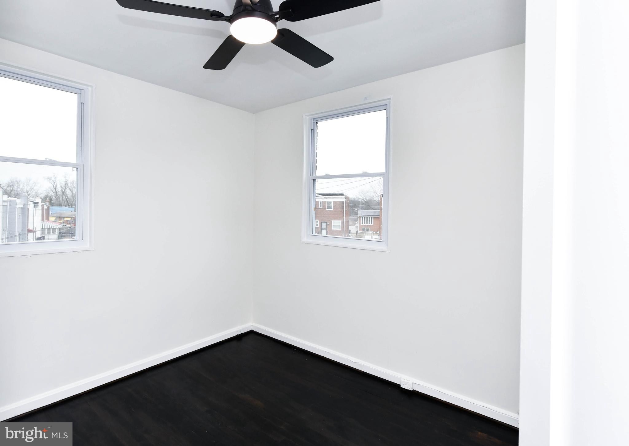 4227 Nash Street Southeast Washington, DC 20020 - Photo 12 of 50 an empty room with a window and a ceiling fan