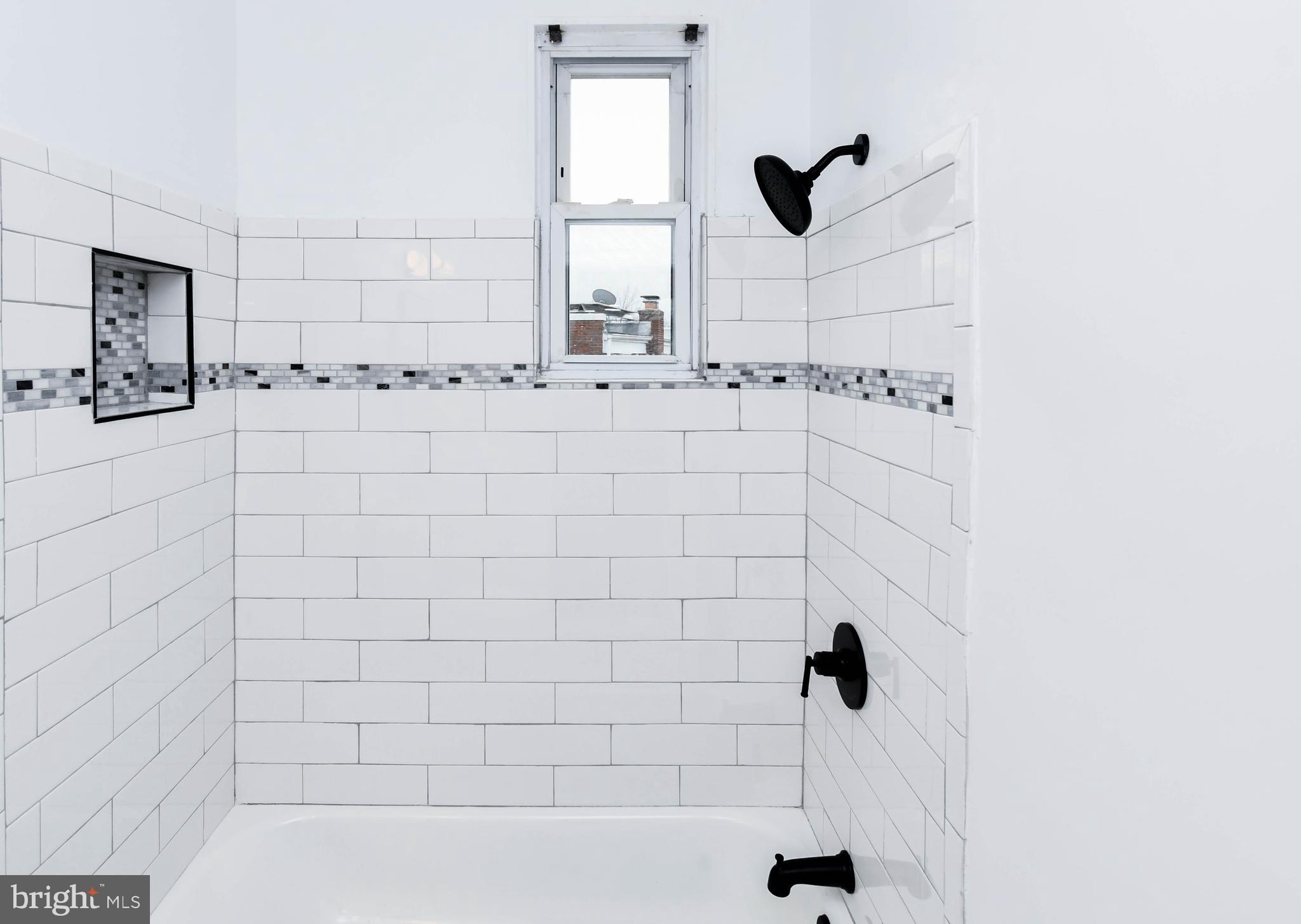 4227 Nash Street Southeast Washington, DC 20020 - Photo 14 of 50 a bathroom with a bathtub