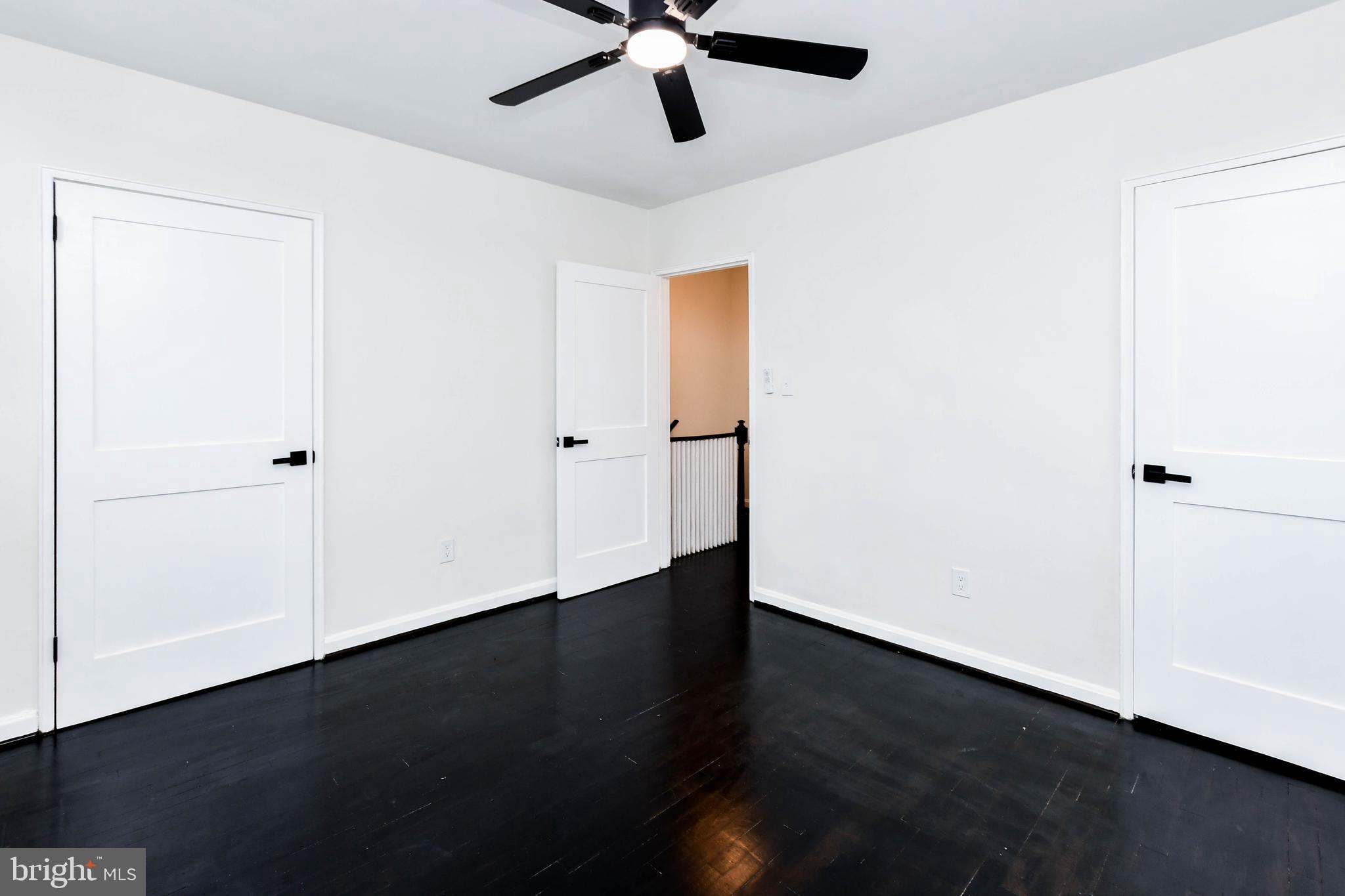 4227 Nash Street Southeast Washington, DC 20020 - Photo 19 of 50 a view of an empty room with wooden floor