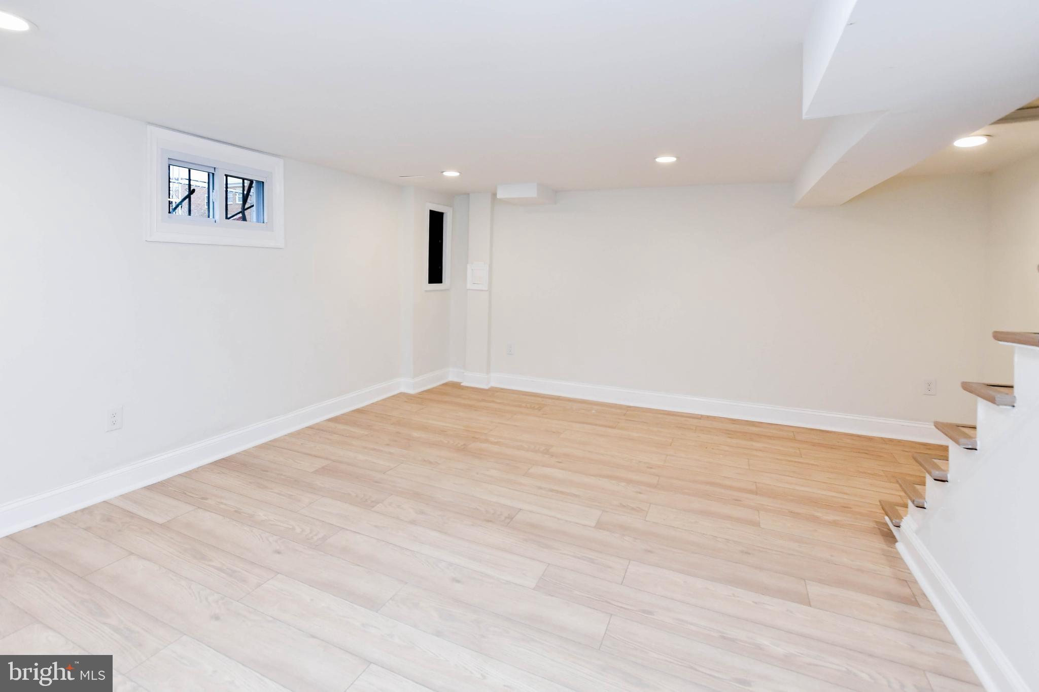 4227 Nash Street Southeast Washington, DC 20020 - Photo 29 of 50 a view of empty room with wooden floor