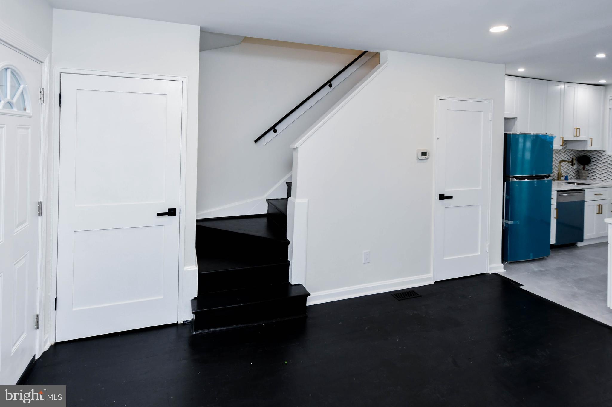 4227 Nash Street Southeast Washington, DC 20020 - Photo 33 of 50 a view of hallway with wooden floor and stairs