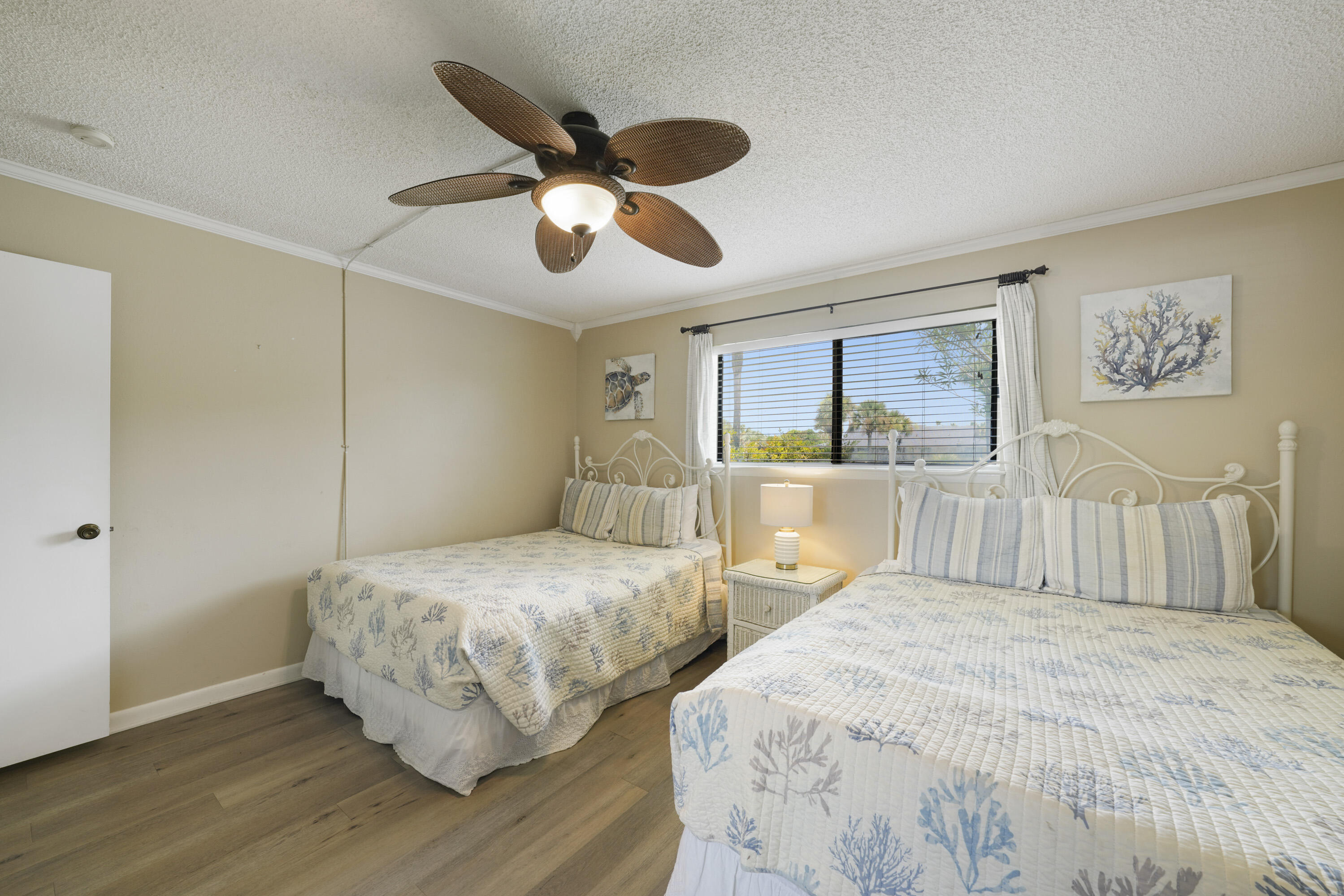 3755 Scenic Highway 98, Unit 1601 Destin, FL 32541 - Photo 20 of 50 a bedroom with double bed and a large mirror