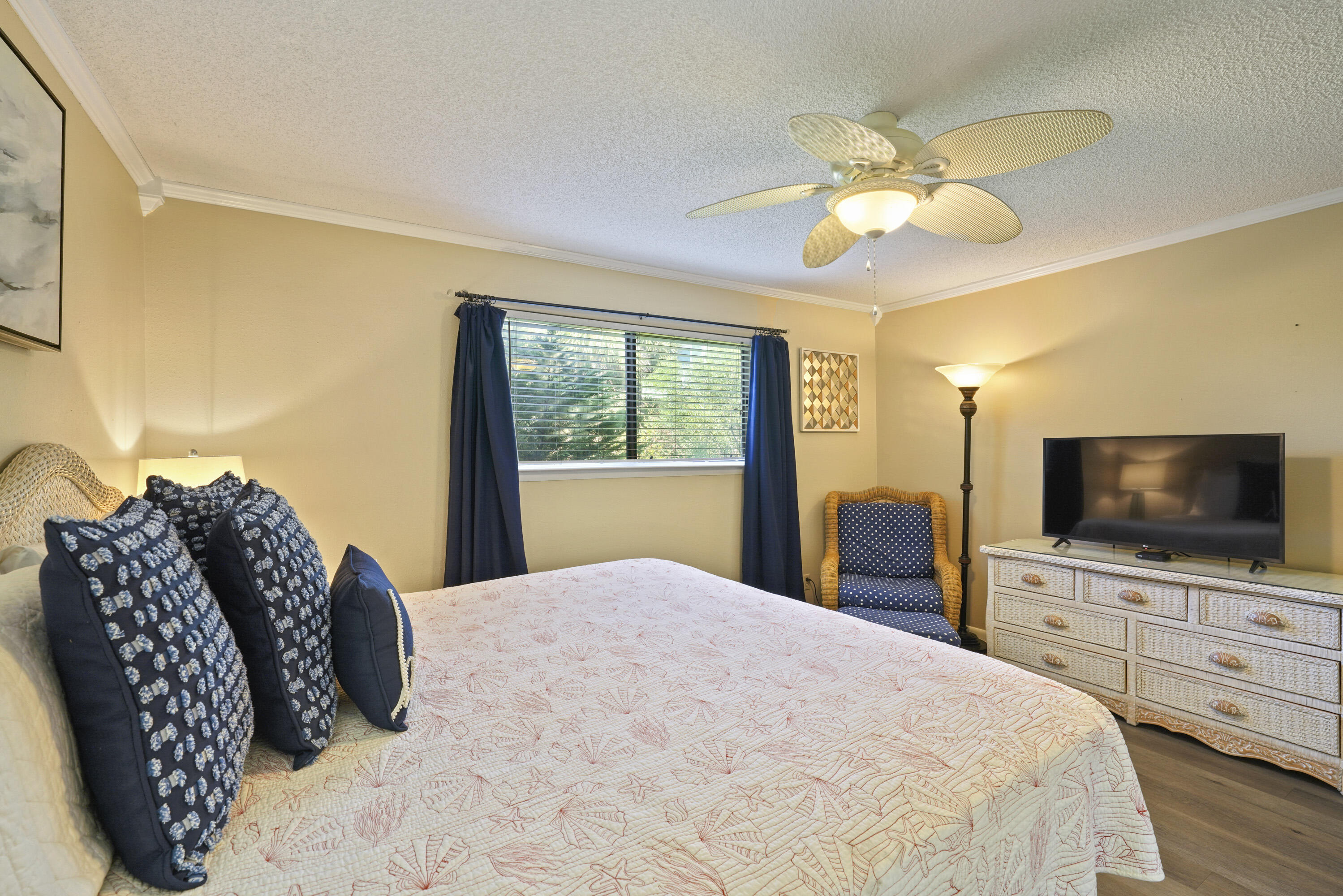3755 Scenic Highway 98, Unit 1601 Destin, FL 32541 - Photo 24 of 50 a bedroom with a bed and a flat screen tv