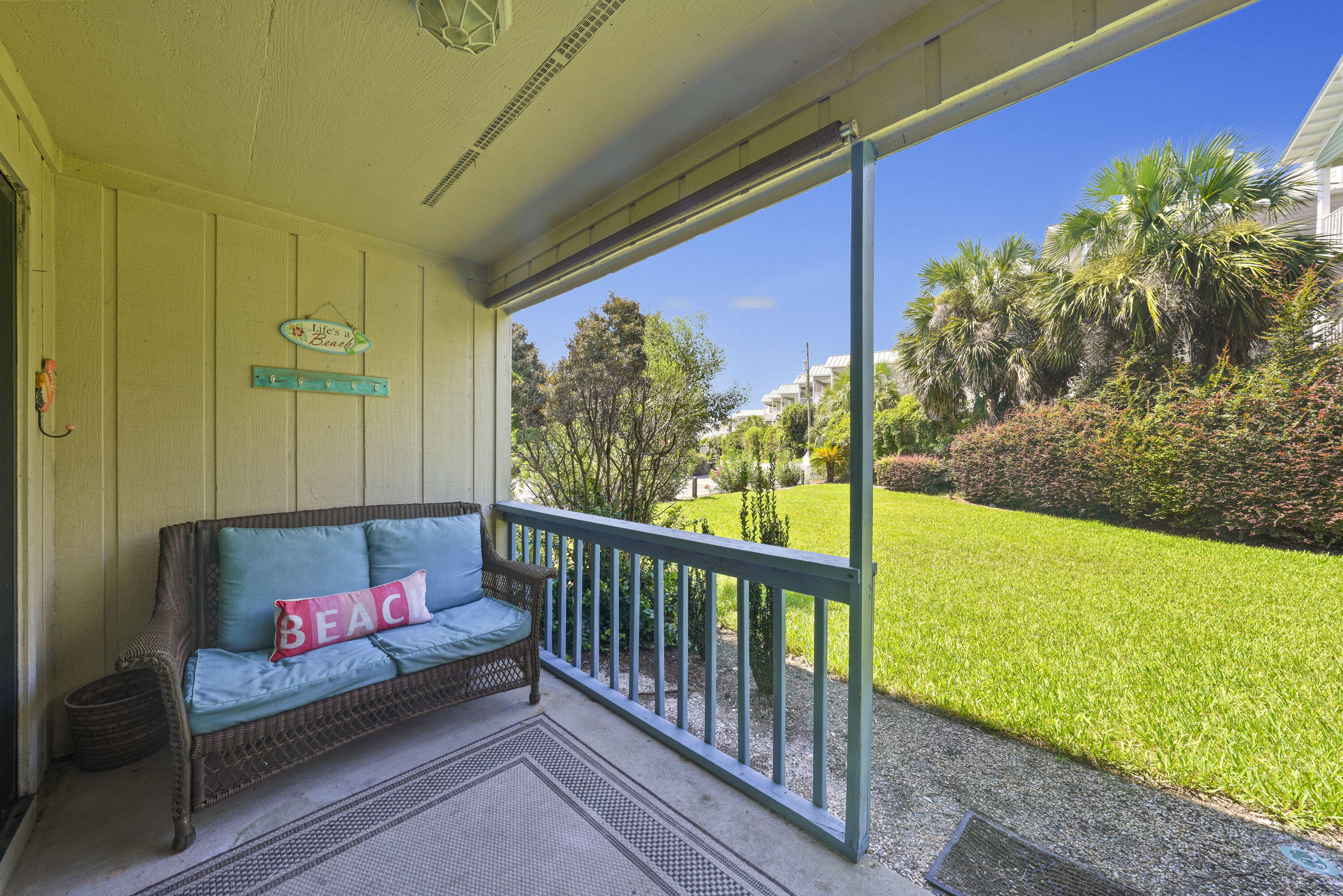 3755 Scenic Highway 98, Unit 1601 Destin, FL 32541 - Photo 28 of 50 a view of a porch with furniture