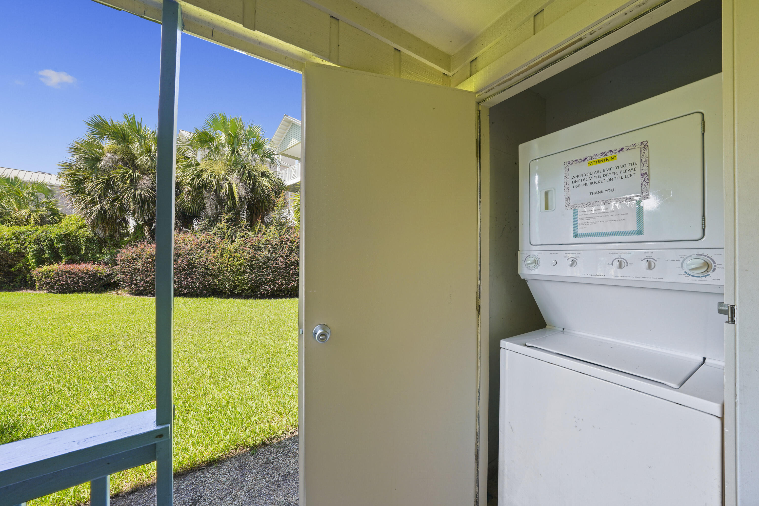 3755 Scenic Highway 98, Unit 1601 Destin, FL 32541 - Photo 29 of 50 a view of a room with washer and dryer