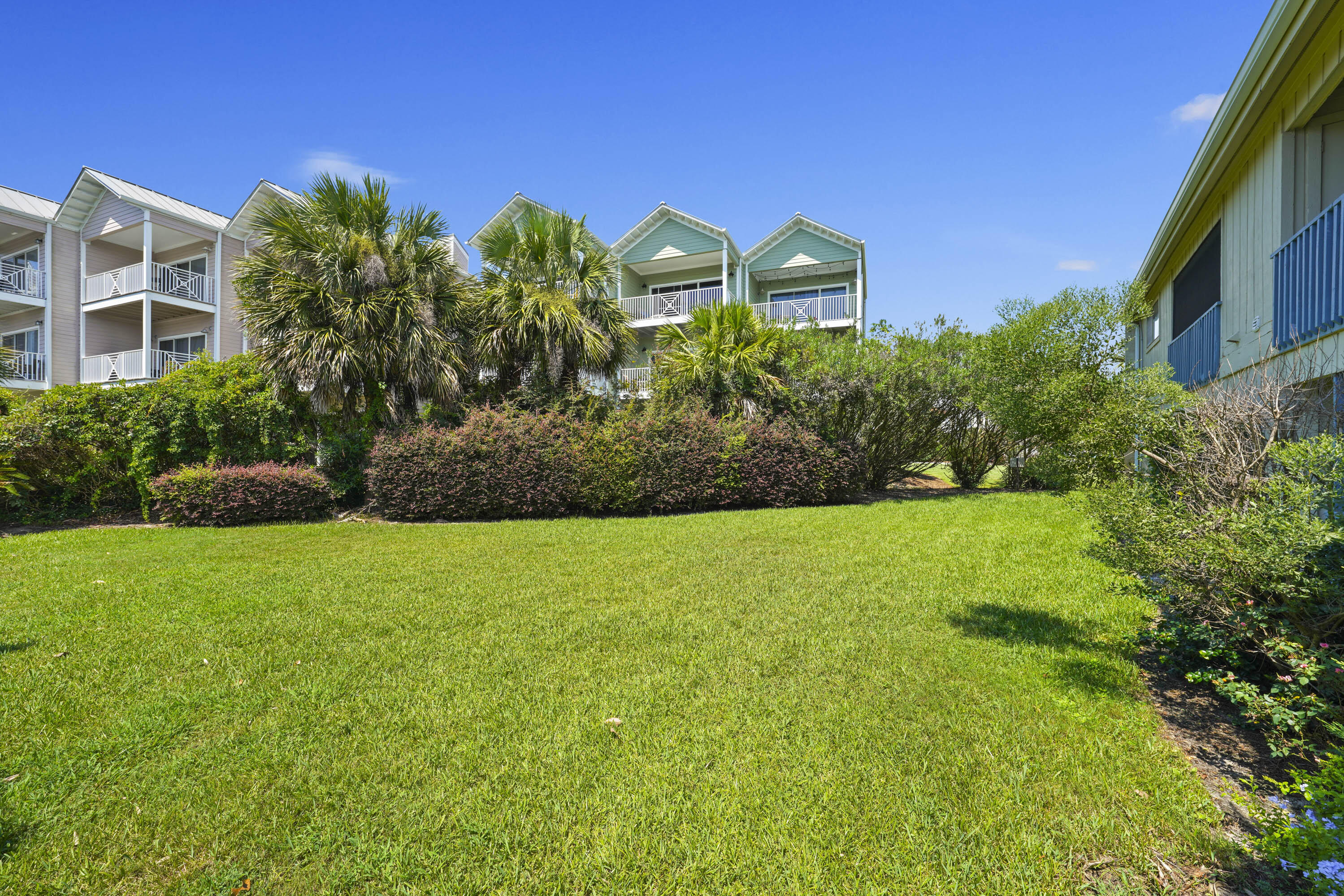 3755 Scenic Highway 98, Unit 1601 Destin, FL 32541 - Photo 31 of 50 a front view of a house with a yard