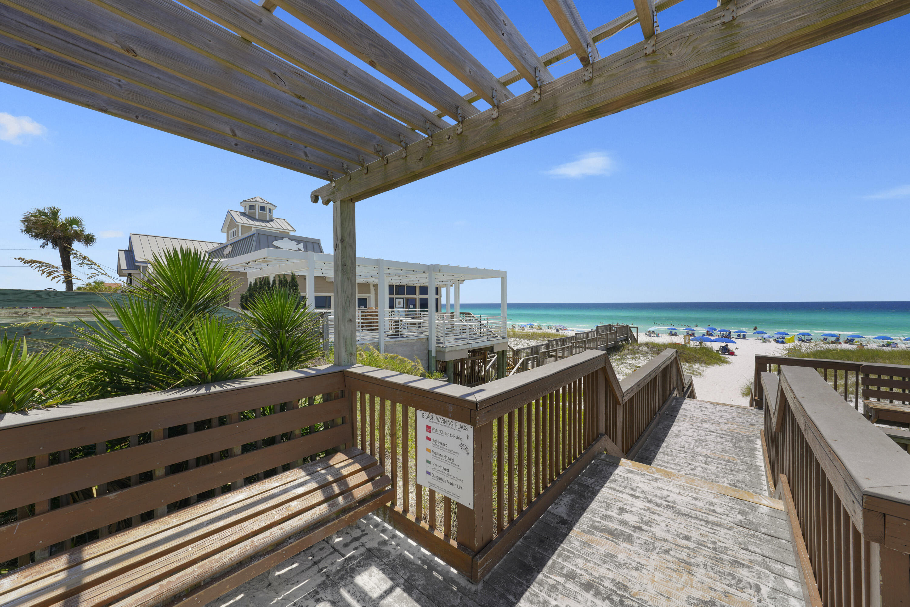 3755 Scenic Highway 98, Unit 1601 Destin, FL 32541 - Photo 47 of 50 a view of a balcony with wooden chairs