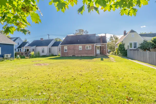 a front view of a house with swimming pool