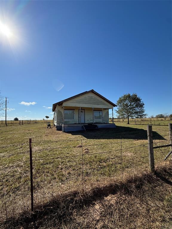 2162 County Road 174 Overton, TX 75684 - Photo 31 of 34 a front view of a house with a yard