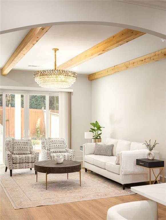 722 Lakeview Avenue Northeast, Unit A Atlanta, GA 30308 - Photo 19 of 48 a living room with furniture and a large window