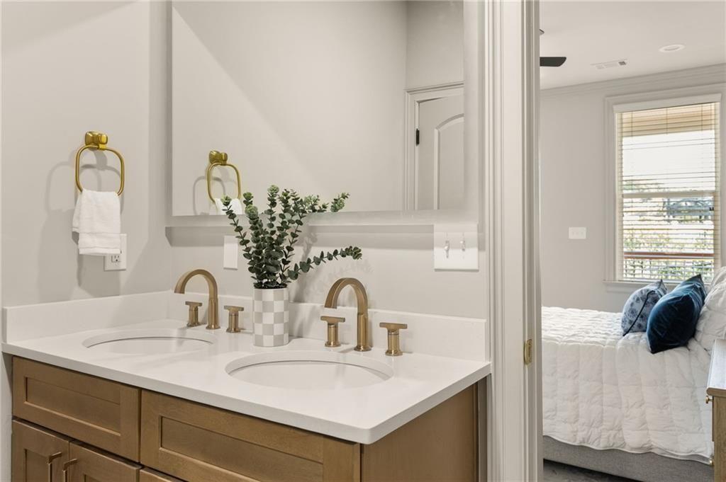 722 Lakeview Avenue Northeast, Unit A Atlanta, GA 30308 - Photo 26 of 48 a bathroom with a sink and a mirror
