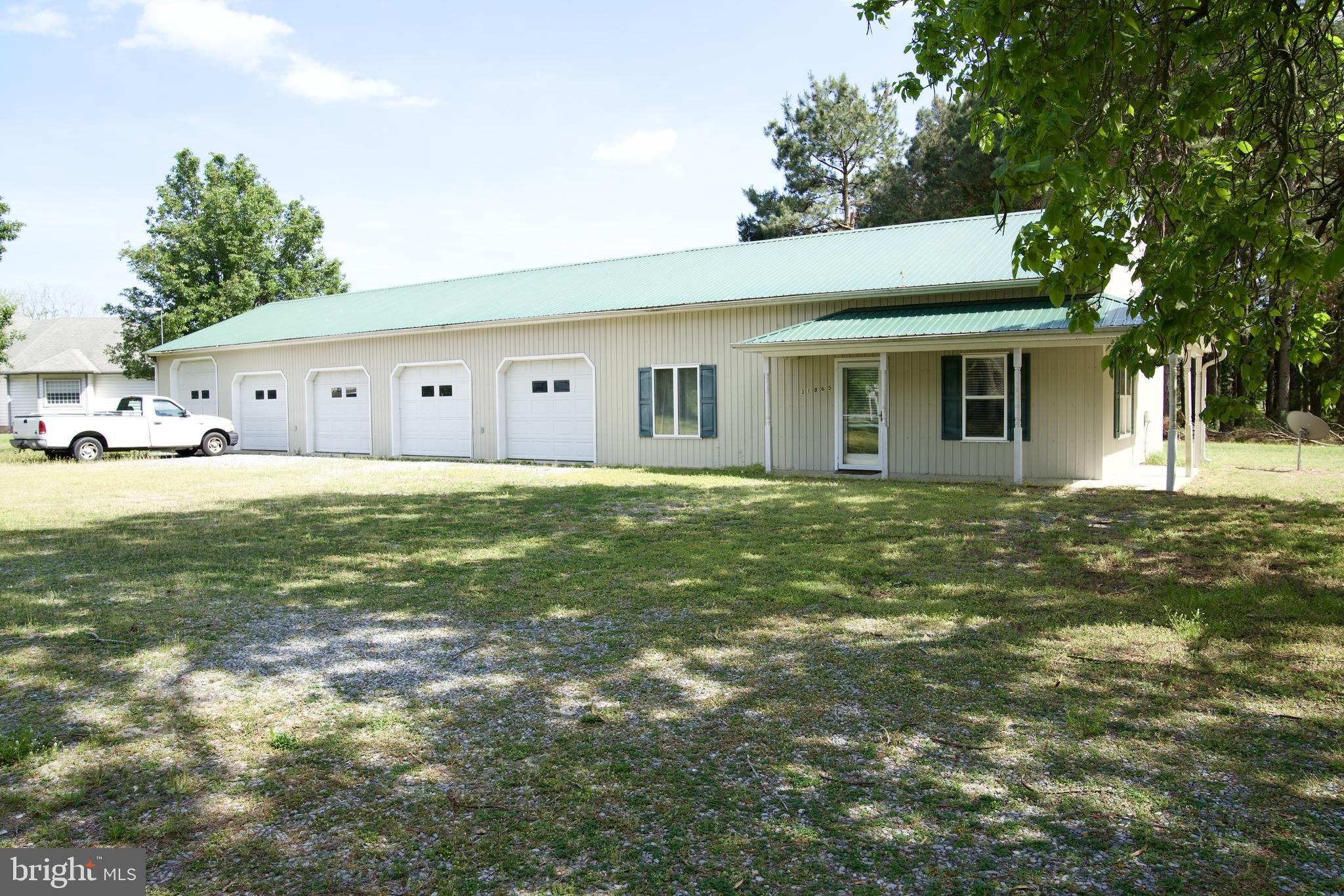 31867 Shavox Road Salisbury, MD 21804 - Photo 26 of 64 a front view of a house with a yard