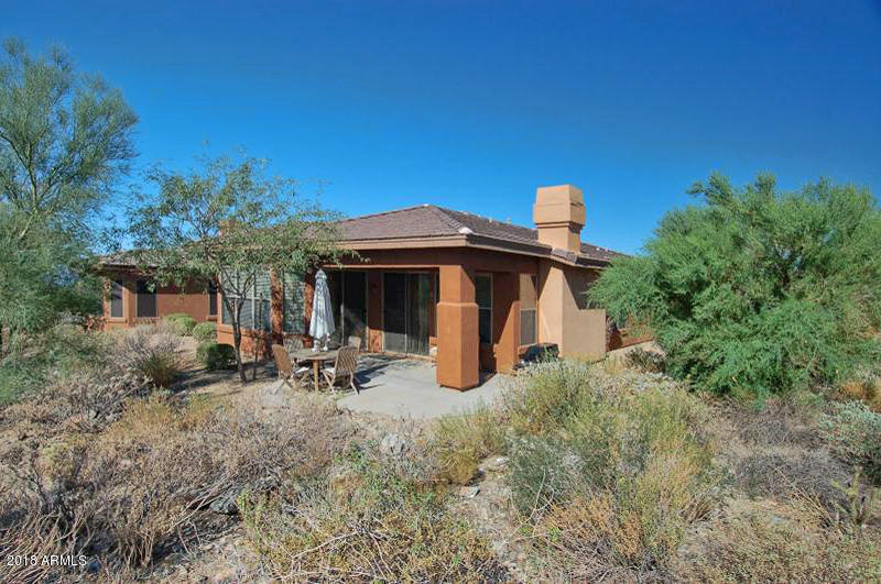 11475 East Helm Drive Scottsdale, AZ 85255 - Photo 20 of 35 a view of a house with a patio