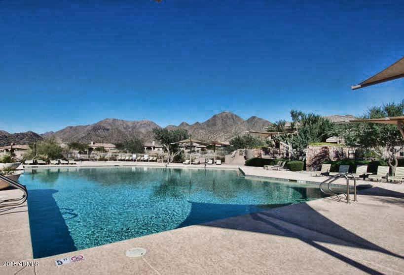 11475 East Helm Drive Scottsdale, AZ 85255 - Photo 28 of 35 a view of a lake with a yard