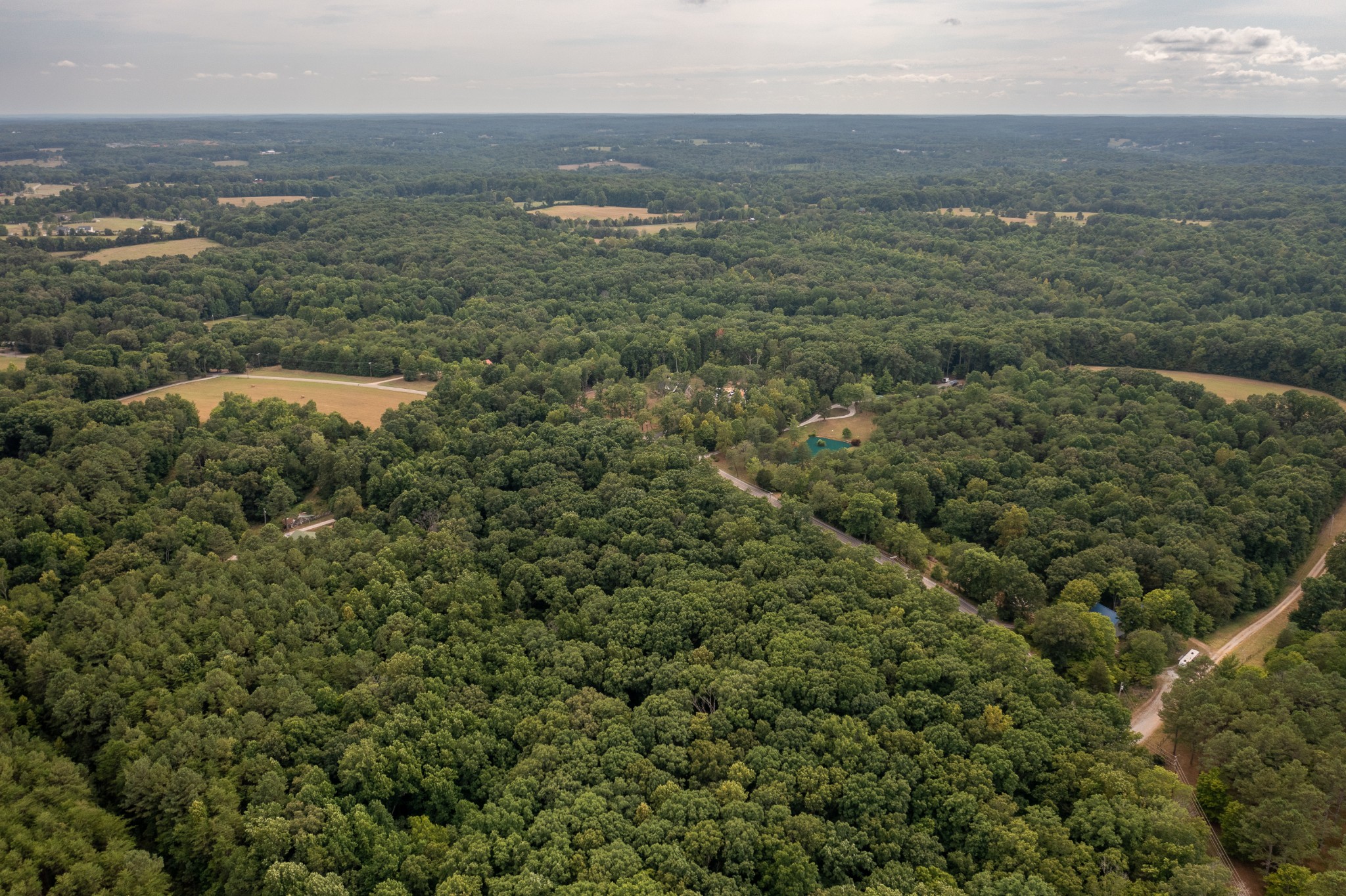 0 Crow Cut Road Northwest Fairview, TN 37062 - Photo 8 of 16 an aerial view of residential houses with outdoor space and trees