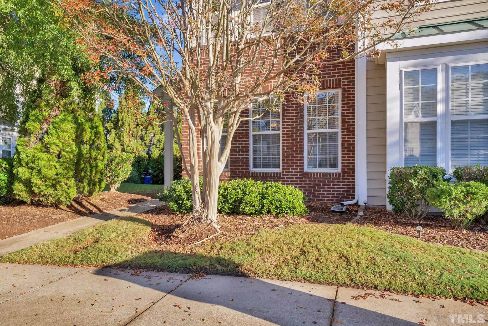 7618 Winners Edge Street Raleigh, NC 27617 - Photo 2 of 22 front view of a house with a yard