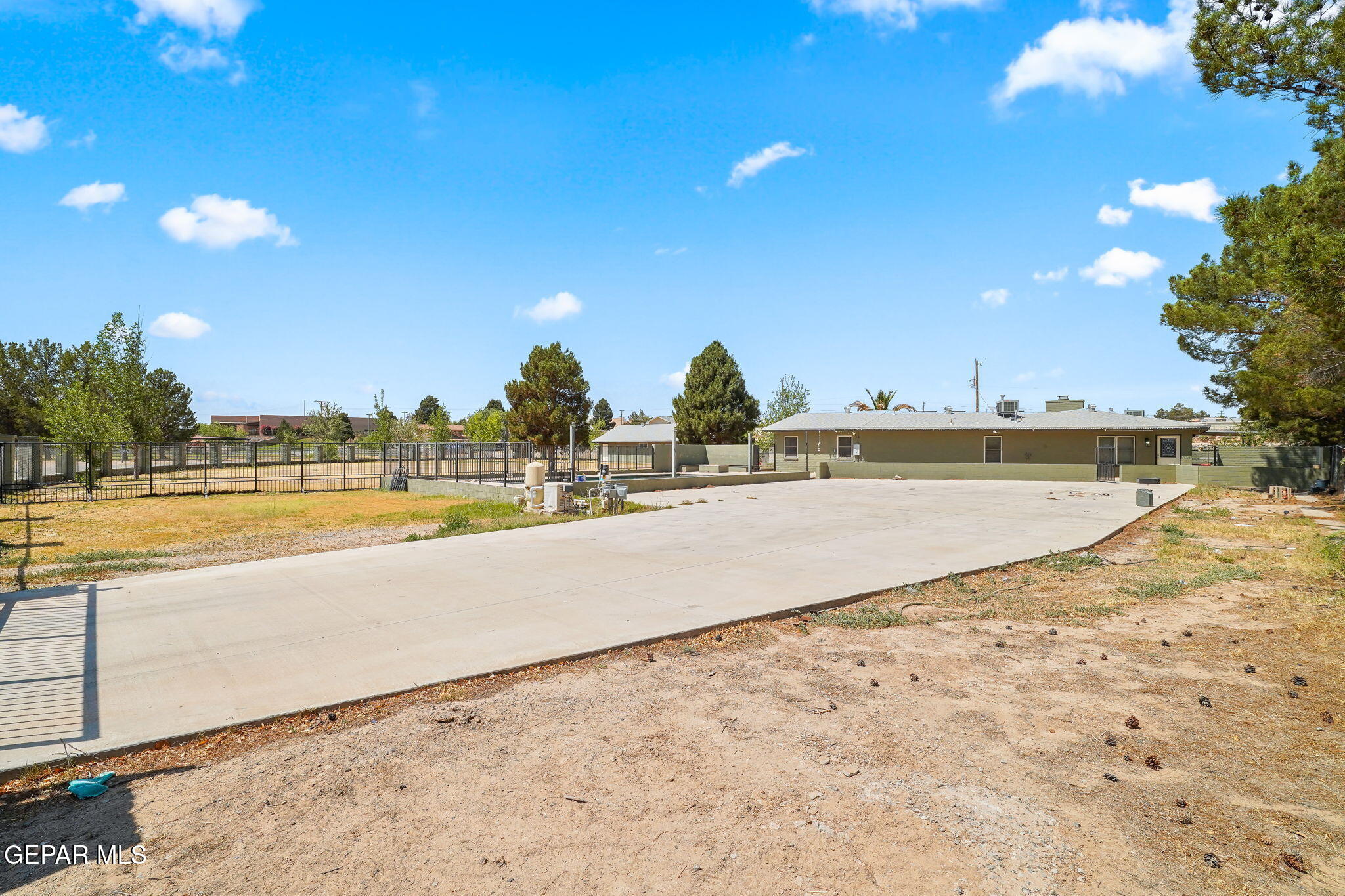 5300 Crawford Road Santa Teresa, NM 88008 - Photo 1 of 87 a view of swimming pool with outdoor seating and yard in back