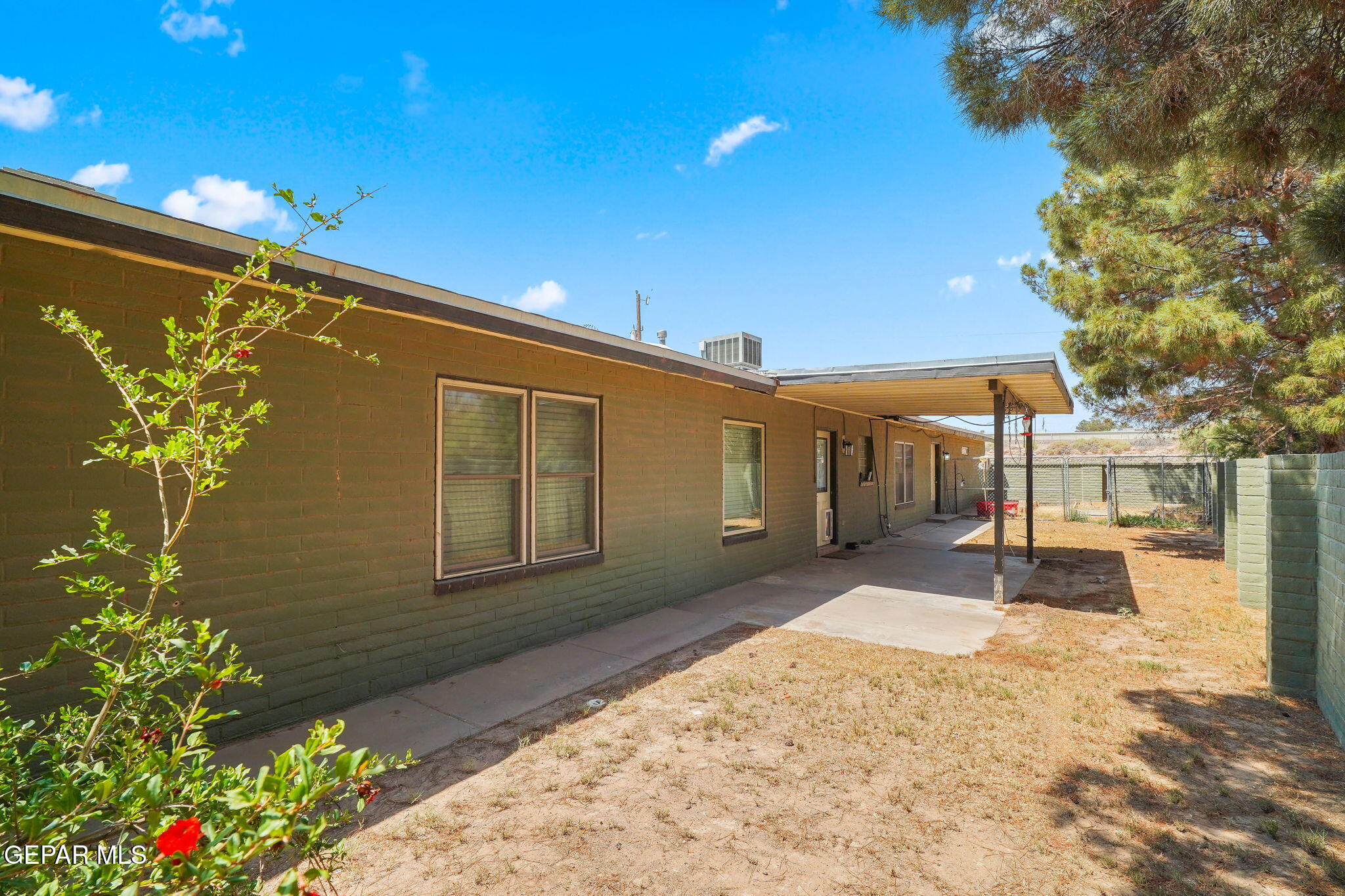 5300 Crawford Road Santa Teresa, NM 88008 - Photo 14 of 87 a front view of a house with a yard