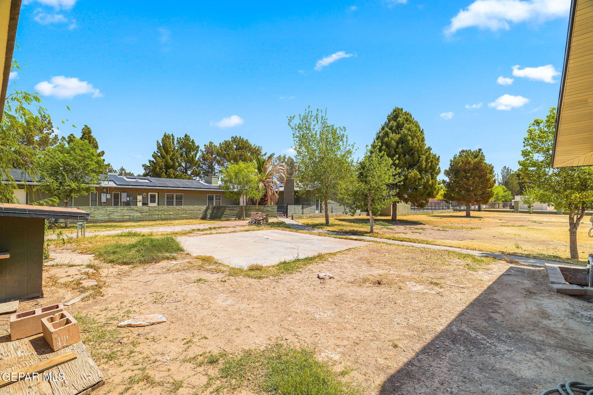 5300 Crawford Road Santa Teresa, NM 88008 - Photo 17 of 87 a view of a swimming pool with an outdoor space and seating area