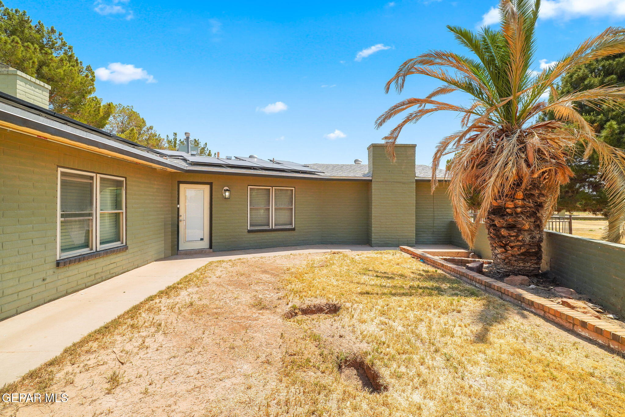 5300 Crawford Road Santa Teresa, NM 88008 - Photo 24 of 87 a front view of a house with a yard