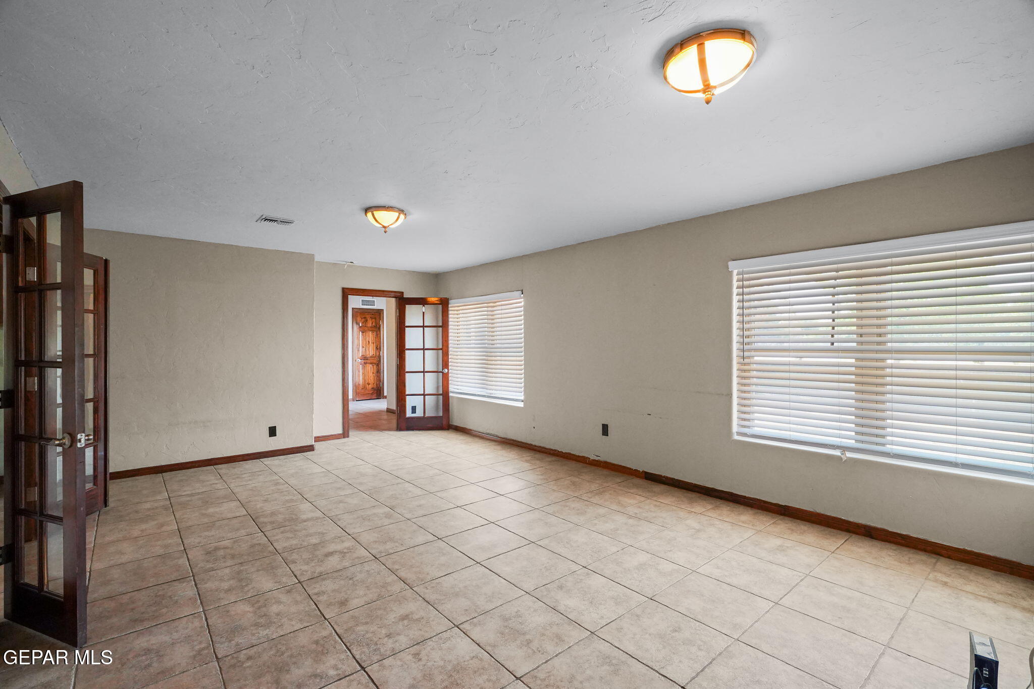 5300 Crawford Road Santa Teresa, NM 88008 - Photo 42 of 87 a view of an empty room with a window