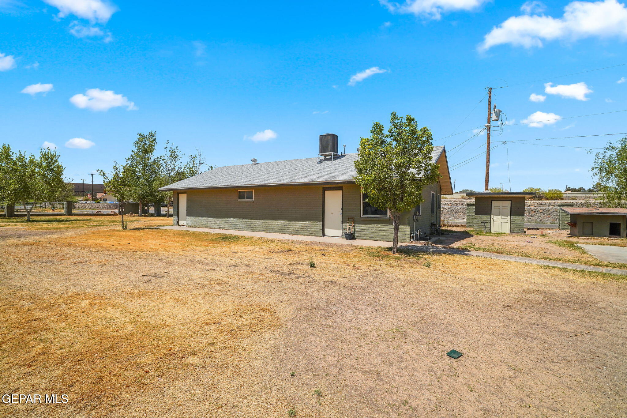 5300 Crawford Road Santa Teresa, NM 88008 - Photo 65 of 87 a view of a house with a yard and tree s