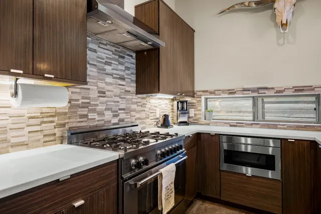 a view of a living room and dining room