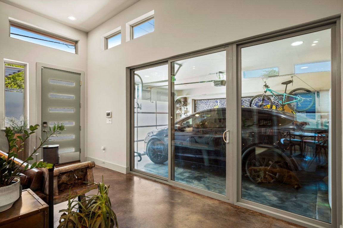 3005 East Martin Luther King Jr Boulevard Austin, TX 78702 - Photo 14 of 39 a room with wooden floor and a potted plant