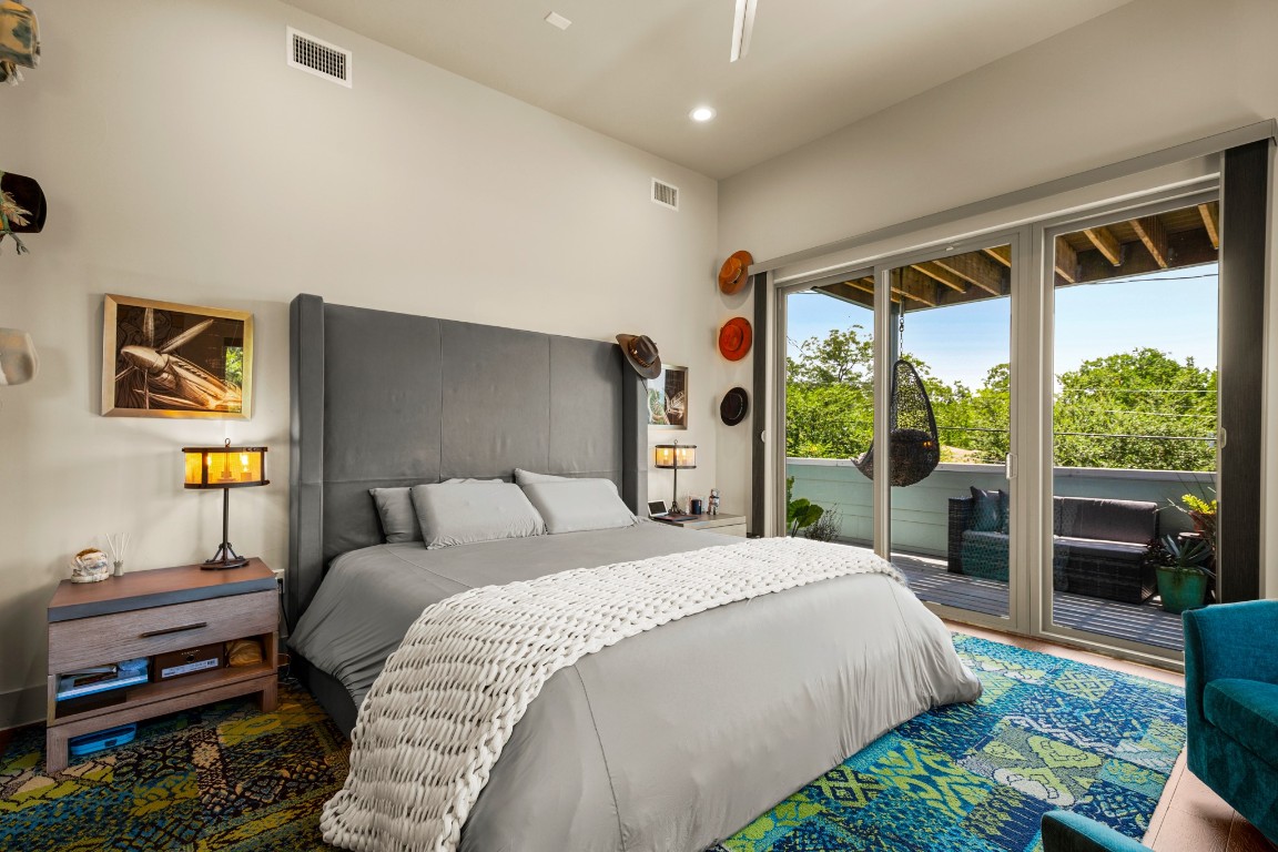 3005 East Martin Luther King Jr Boulevard Austin, TX 78702 - Photo 29 of 39 a bedroom with a bed and a large window