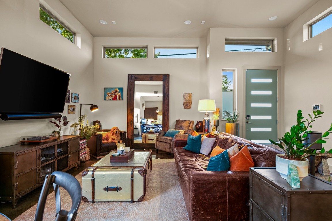 3005 East Martin Luther King Jr Boulevard Austin, TX 78702 - Photo 6 of 39 a living room with furniture and a flat screen tv