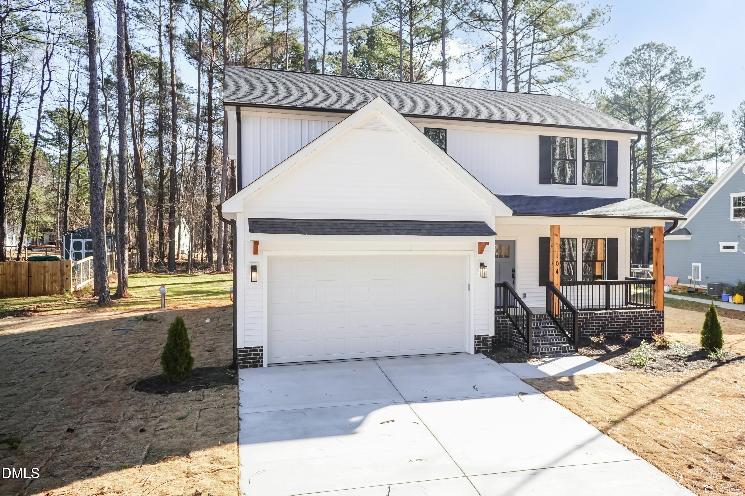 104 Buffalo Drive Spring Hope, NC 27882 - Photo 3 of 48 a view of a white house with a outdoor space