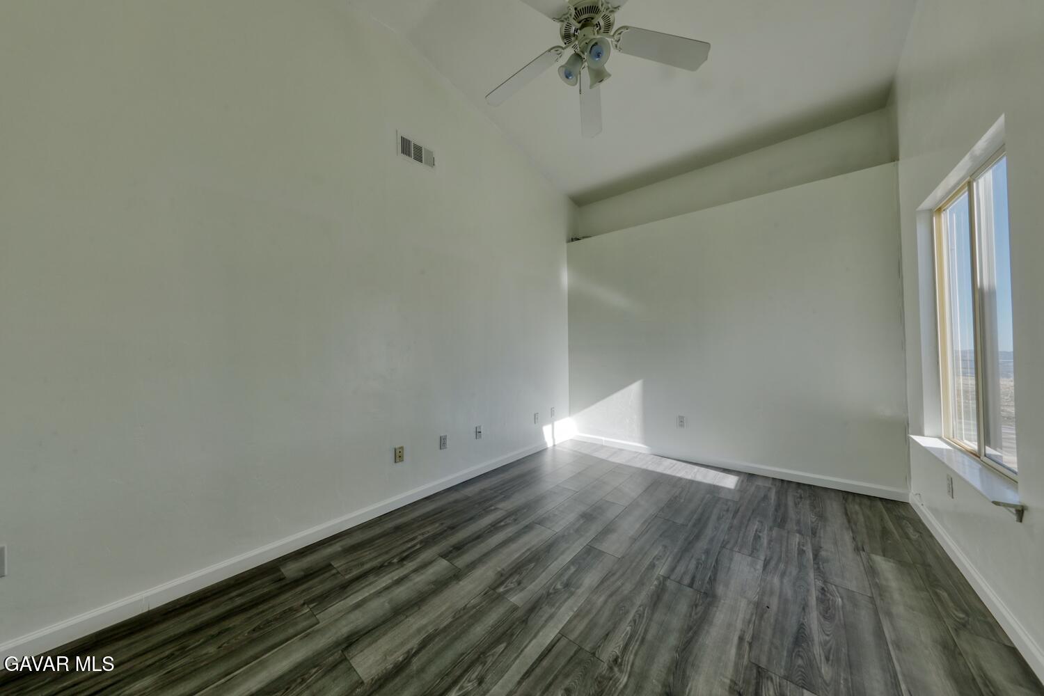 26801 Cabriolet Court Tehachapi, CA 93561 - Photo 18 of 60 a view of an empty room and wooden floor