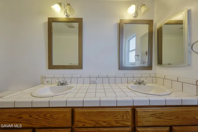 an empty room with wooden floor