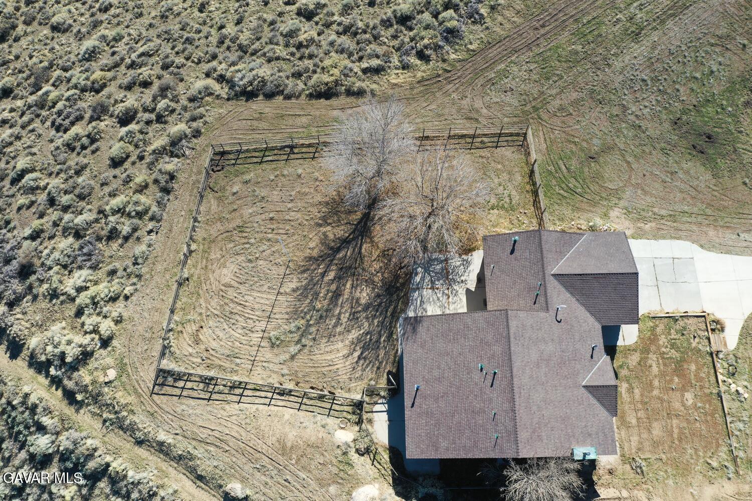 26801 Cabriolet Court Tehachapi, CA 93561 - Photo 55 of 60 an aerial view of a house with a yard