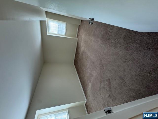 360 Knickerbocker Road, Unit 28 Dumont, NJ 07628 - Photo 6 of 11 a view of an empty room and window